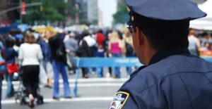 A police officer surveys the crowd