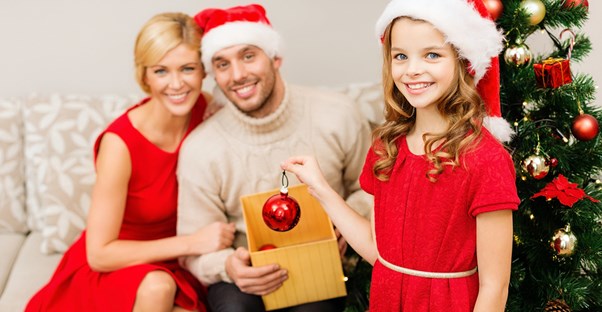 A family decorating for christmas