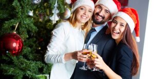 Coworkers celebrate the holidays with drinks