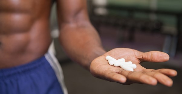 a man who is exploring workout supplements