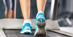 a woman exercising in a home gym