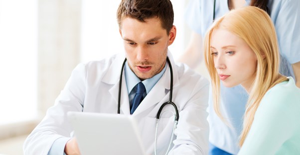 a doctor explaining the health risks of a tubectomy