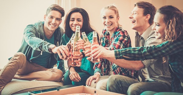 Group of friends having fun not watching the Victoria's Secret Fashion Show