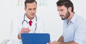 a doctor explaining erectile dysfunction causes