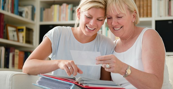 A daughter thanks her mother for the photo book she got for Christmas