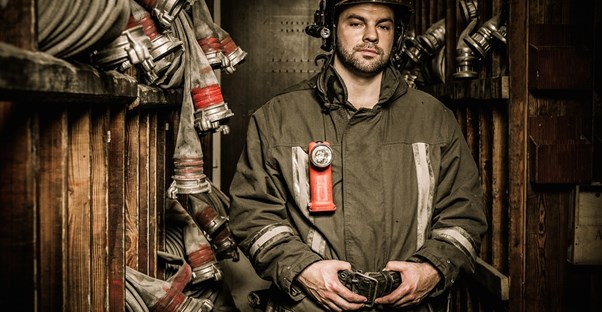 A firefighter gets ready
