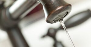 A sink being used in an antique home.