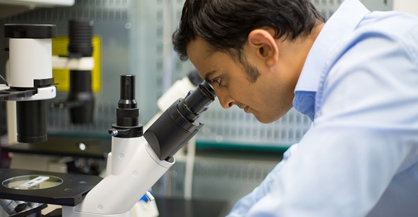 a lab technician diagnosing hemophilia