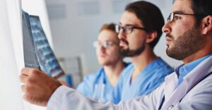 medical professionals discussing hemophilia causes