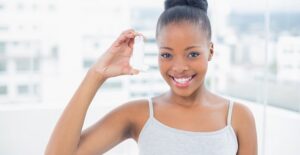 a woman who is curious about whether an expired inhaler is safe