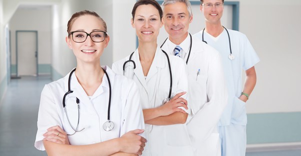 Physician assistants line up for a picture