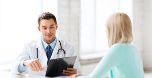 a doctor who is diagnosing kidney cancer
