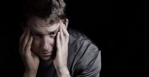 a man who is suffering from cluster headaches