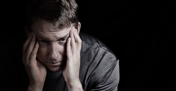a man who is suffering from cluster headaches