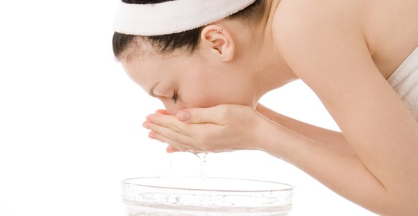 a woman using a blackhead treatment