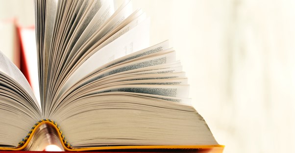 Self published book open on a table