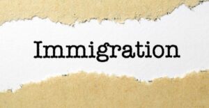 A label on a file folder labeled immigration