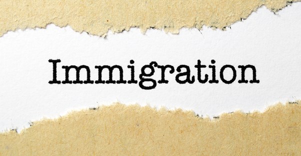 A label on a file folder labeled immigration