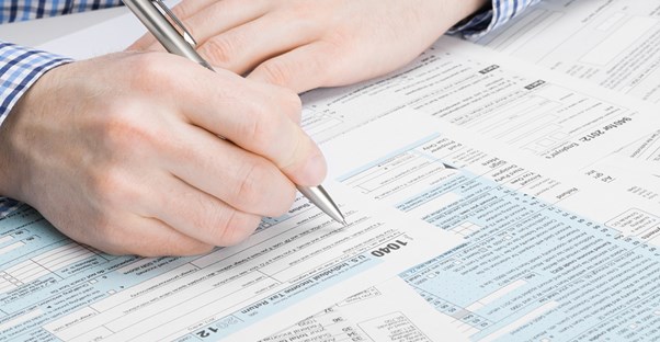 A taxpayer calculating his taxes for the year