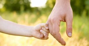 a parent and child working through junior rheumatoid arthritis