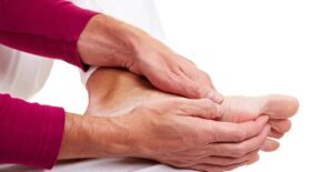 a man experiencing foot pain