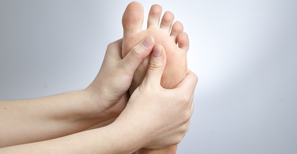 a man experiencing diabetes foot pain