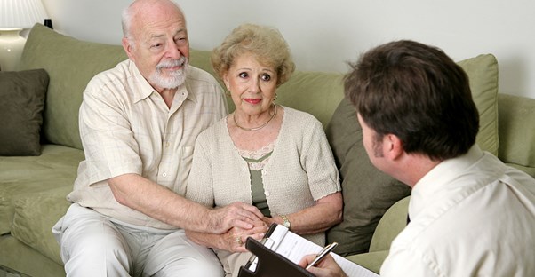 A funeral director works with the families of the deceased.