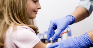 a girl whose parents don't believe deadly vaccine myths