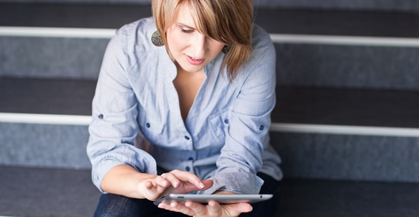Woman researching online MBAs