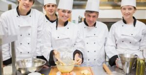 A groups of chefs make a mess in the kitchen