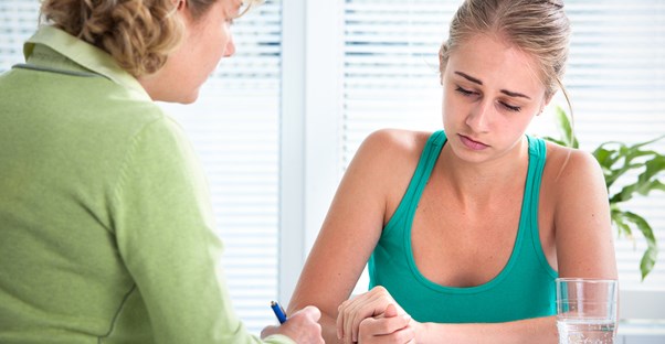 a woman receiving postpartum support