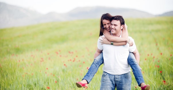A happy couple who have separate checking accounts