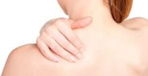 a woman experiencing meningitis signs and symptoms