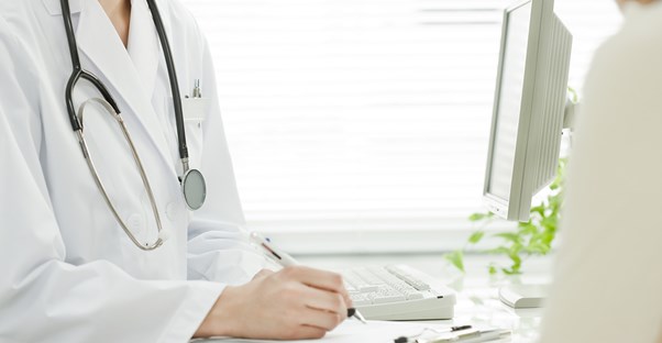 a doctor explaining bacterial meningitis terms