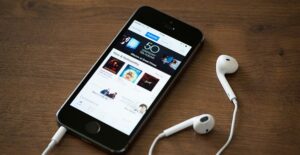 An iPhone playing country rap music