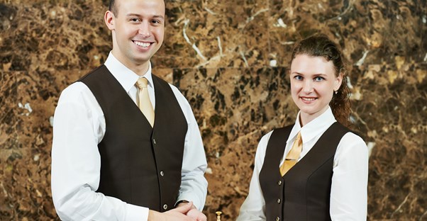 Receptionists take a break from their duties to take a picture together