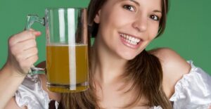 Woman drinking for St. Patrick's Day