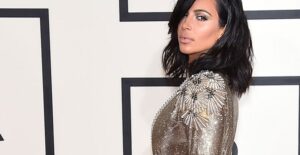 Kim Kardashian poses on the red carpet