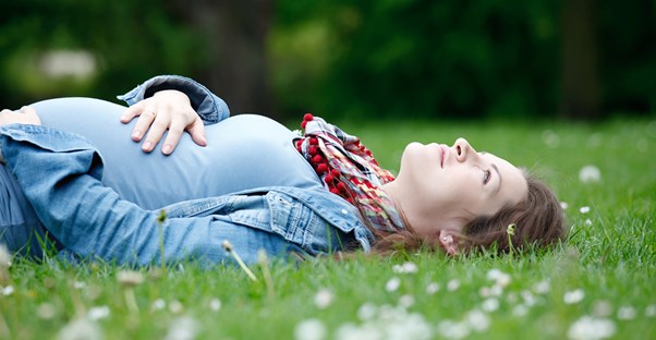 A woman contemplates a C-section vs. a natural birth