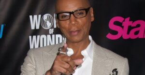 RuPaul pointing at the camera