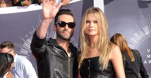 Adam Levine with his wife Behati