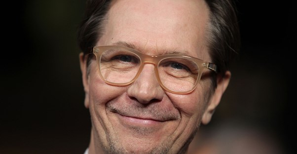 Gary Oldman smiling.