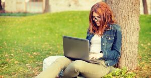 Woman researching business schools