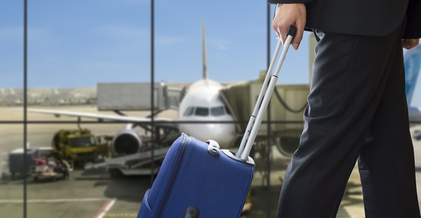 Businessman returning from a trip abroad