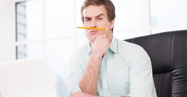 Young man contemplates his potential April Fools Day pranks