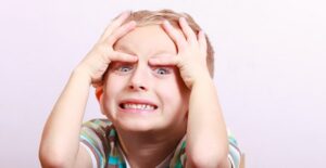 Little boy surprised by an April Fools' joke