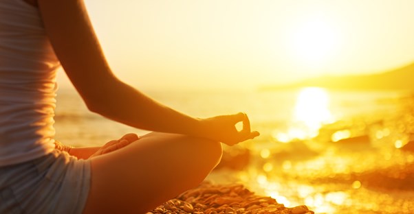 A woman relieves stress with yoga