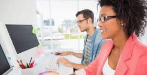 Employees work on their typing skills