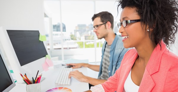 Employees work on their typing skills