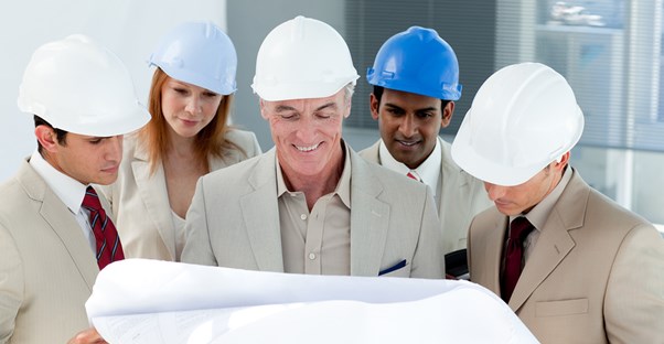A team of coworkers makes a plan